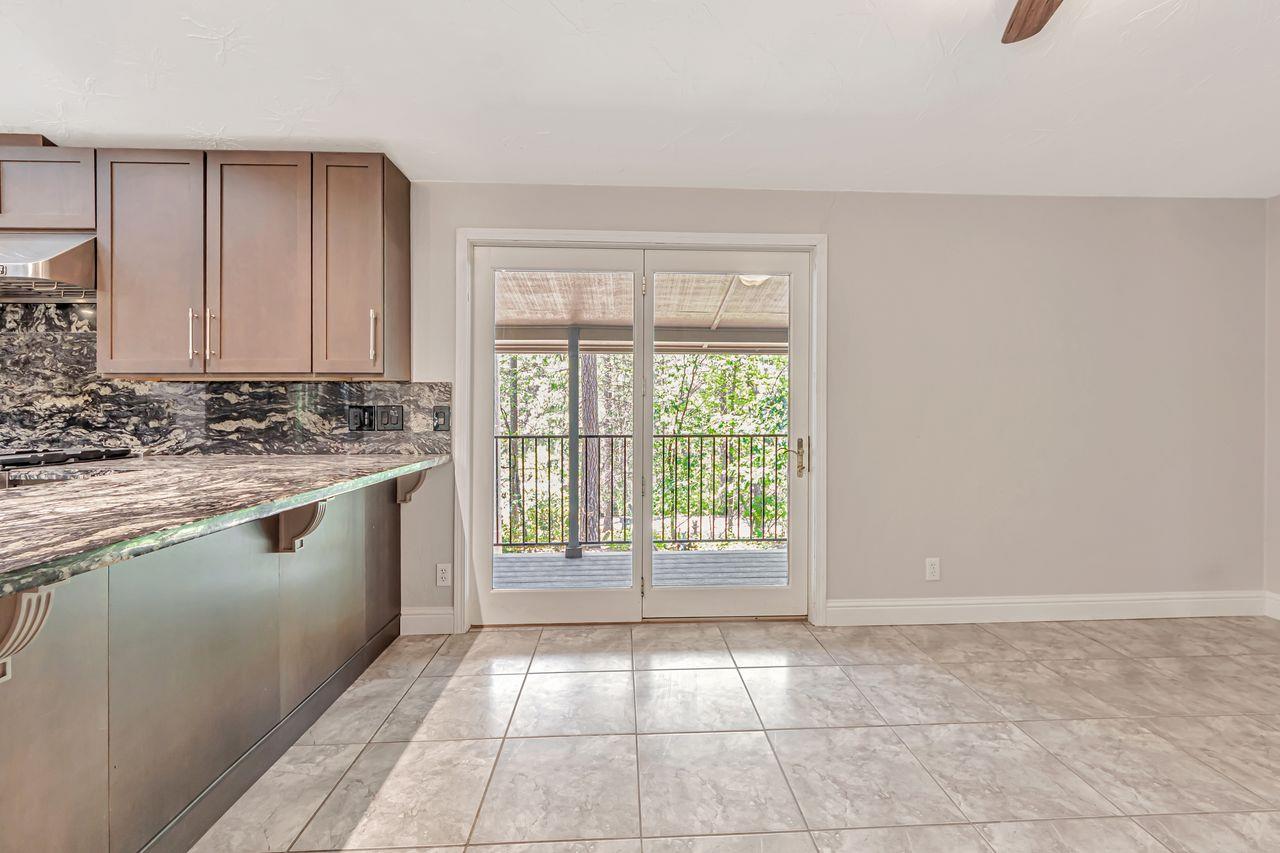 571 B Lane Applegate, CA 95703 - Photo 39 of 85 a kitchen with a stove a sink and a cabinets