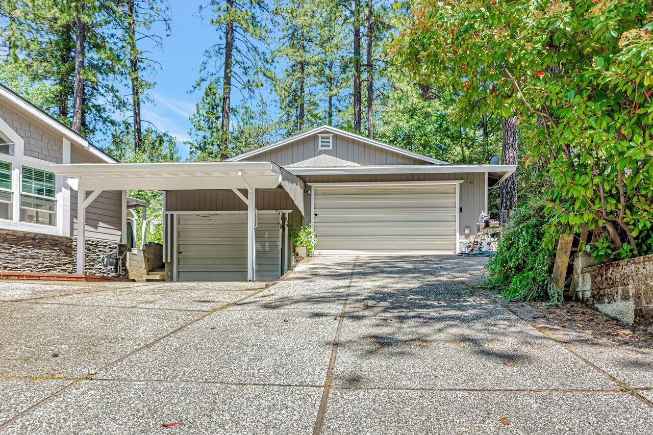 571 B Lane Applegate, CA 95703 - Photo 4 of 85 a front view of a house with a garage