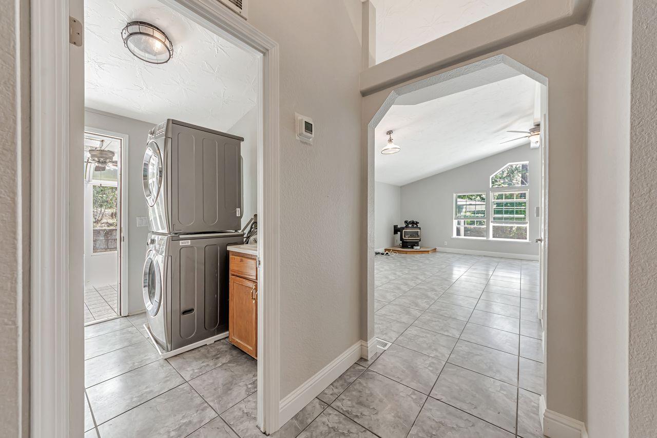 571 B Lane Applegate, CA 95703 - Photo 62 of 85 a view of hallway with furniture and a refrigerator