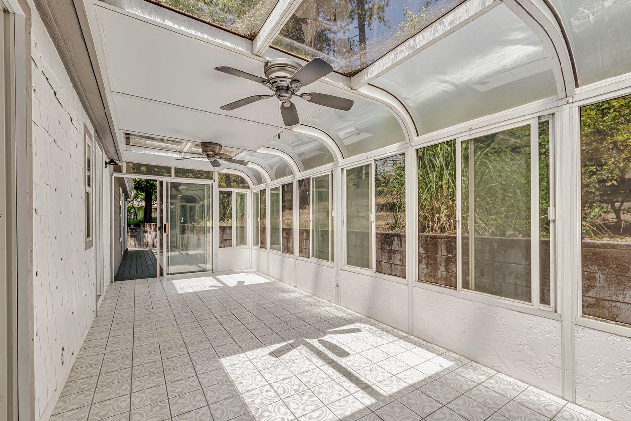 571 B Lane Applegate, CA 95703 - Photo 72 of 85 a view of a porch with wooden floor and furniture
