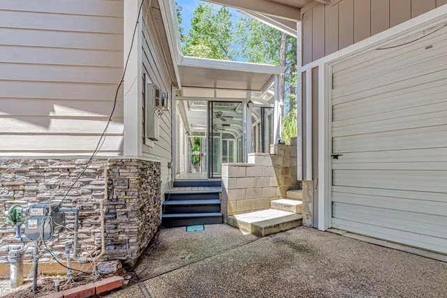 a view of a balcony with wooden floor