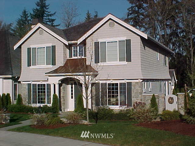 20014 27th Avenue Southeast Bothell, WA 98021 - Photo 1 of 1 a front view of a house with a yard