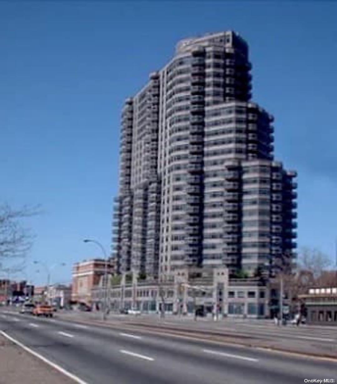 a view of a building and a street