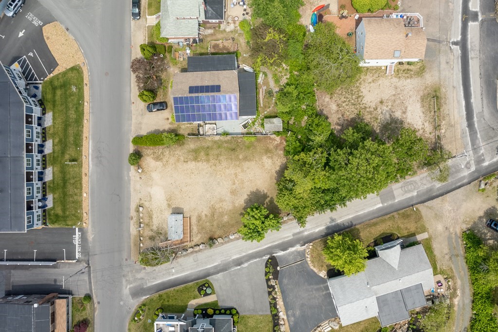 2 Long Beach Road Gloucester, MA 01930 - Photo 6 of 11 an aerial view of a house with a yard