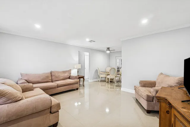 a living room with furniture and a couch