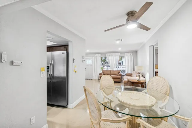 a dining room with furniture and a dining table