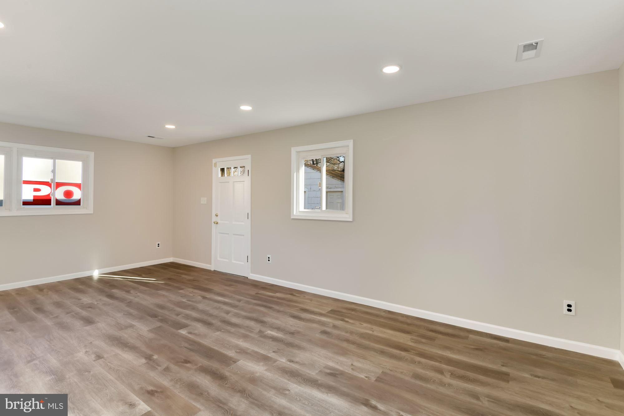 6705 Adelphi Road University Park, MD 20782 - Photo 15 of 35 with brand new lvp flooring