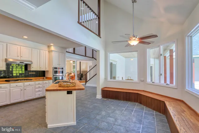a bathroom with a sink and a window