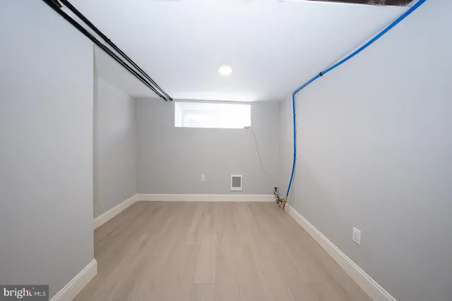 a view of entryway with stairs and white walls