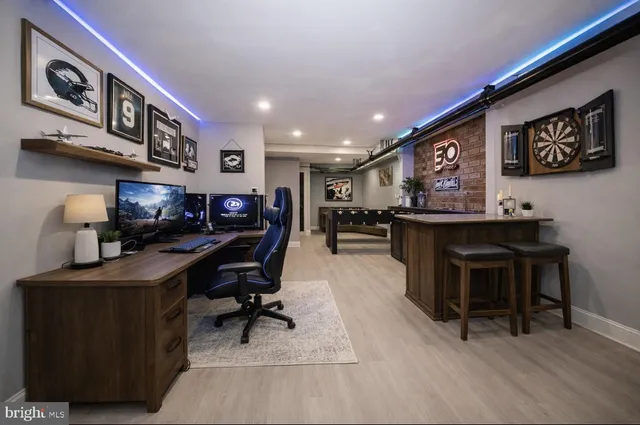 a view of a workspace with furniture