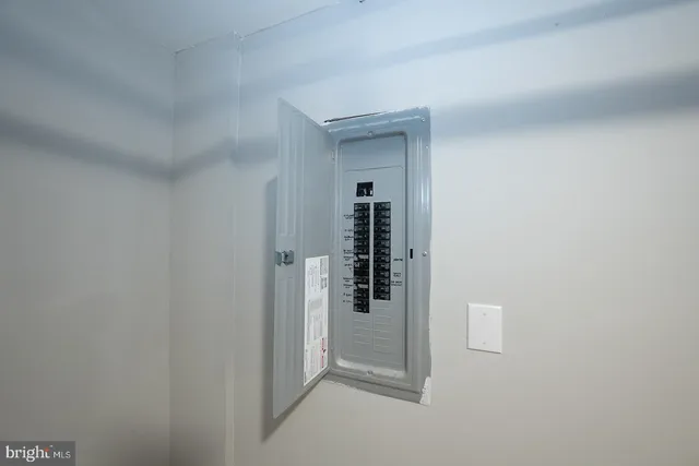 a front view of a house with parking space