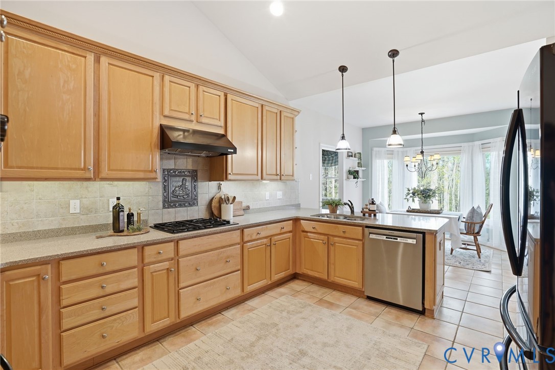 14430 Overlook Ridge Lane Beaverdam, VA 23015 - Photo 4 of 71 a kitchen with stainless steel appliances granite countertop a sink a stove and a refrigerator