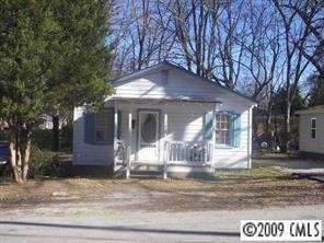 605 South Market Street Lancaster, SC 29720 - Photo 1 of 1 a front view of a house with garden