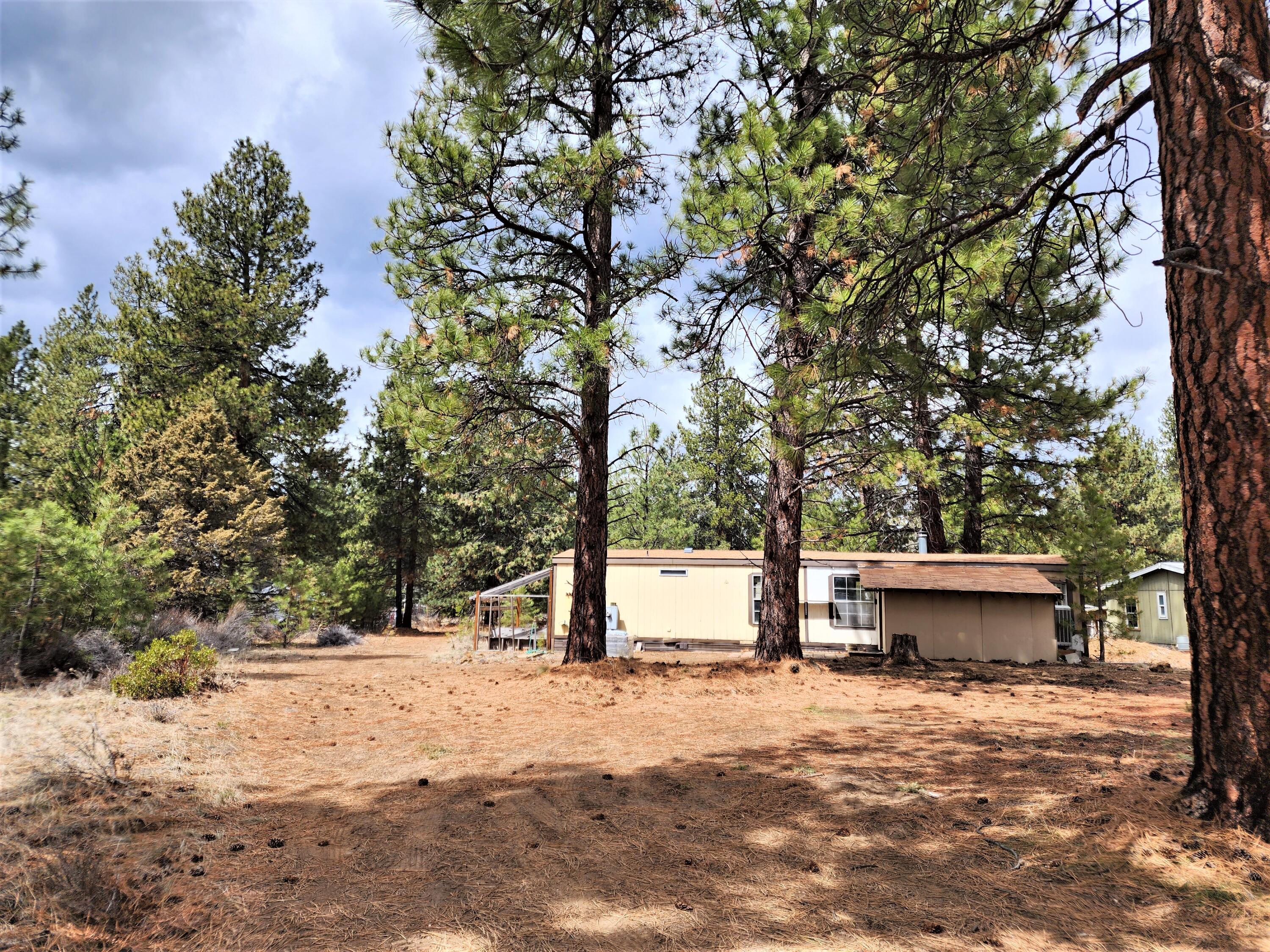 60019 Cheyenne Road Bend, OR 97702 - Photo 4 of 10 Older manufactured home on property
