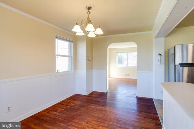 a bathroom with a sink a vanity and a mirror