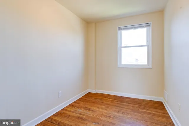a view of utility room and bedroom