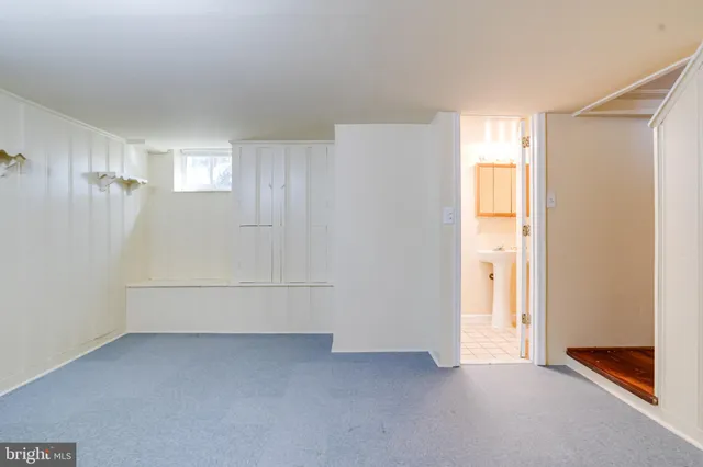 a view of a backyard with sitting area