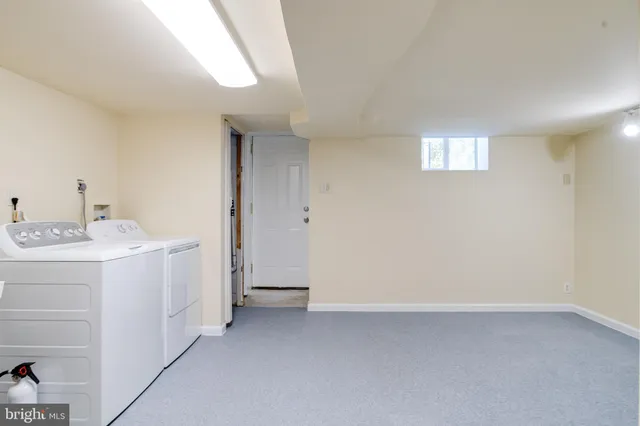 a picture of a bench in front of a window