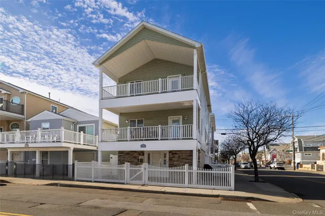 a front view of a building with a pathway