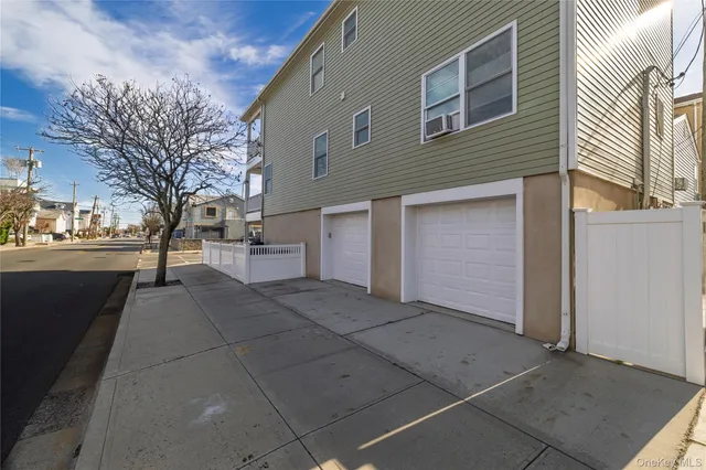 a view of a street with a balcony