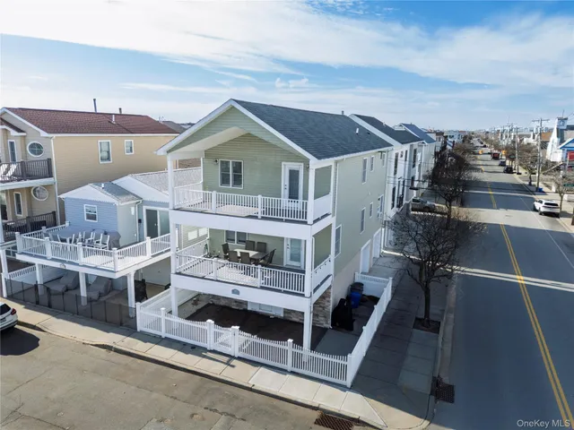 a view of a house with roof deck