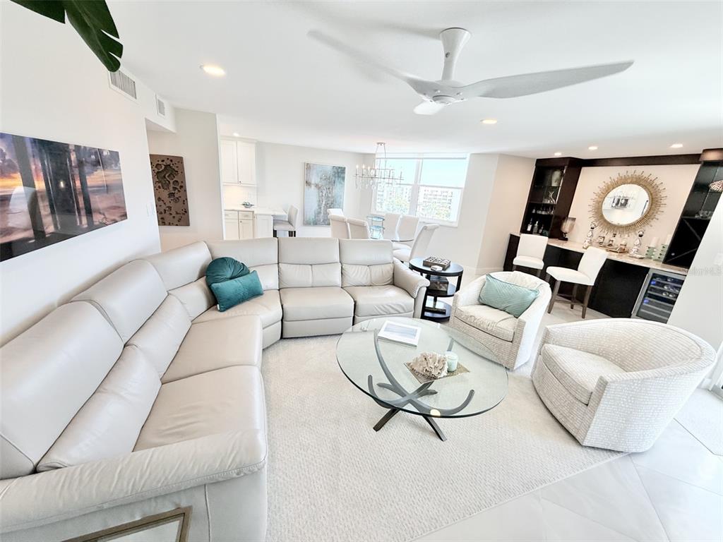 1050 Longboat Club Road, Unit 803 Longboat Key, FL 34228 - Photo 7 of 39 a living room with furniture and a table