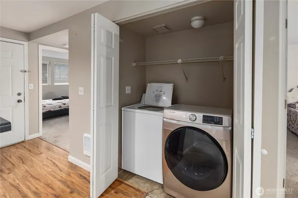 a utility room with dryer and washer