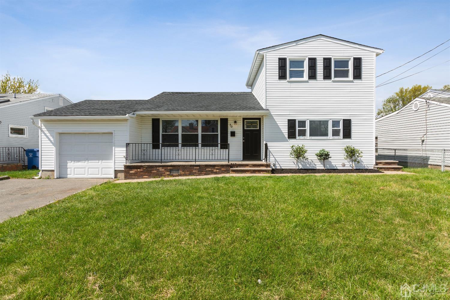 70 Westminster Road Colonia, NJ 07067 - Photo 1 of 12 a front view of house with yard