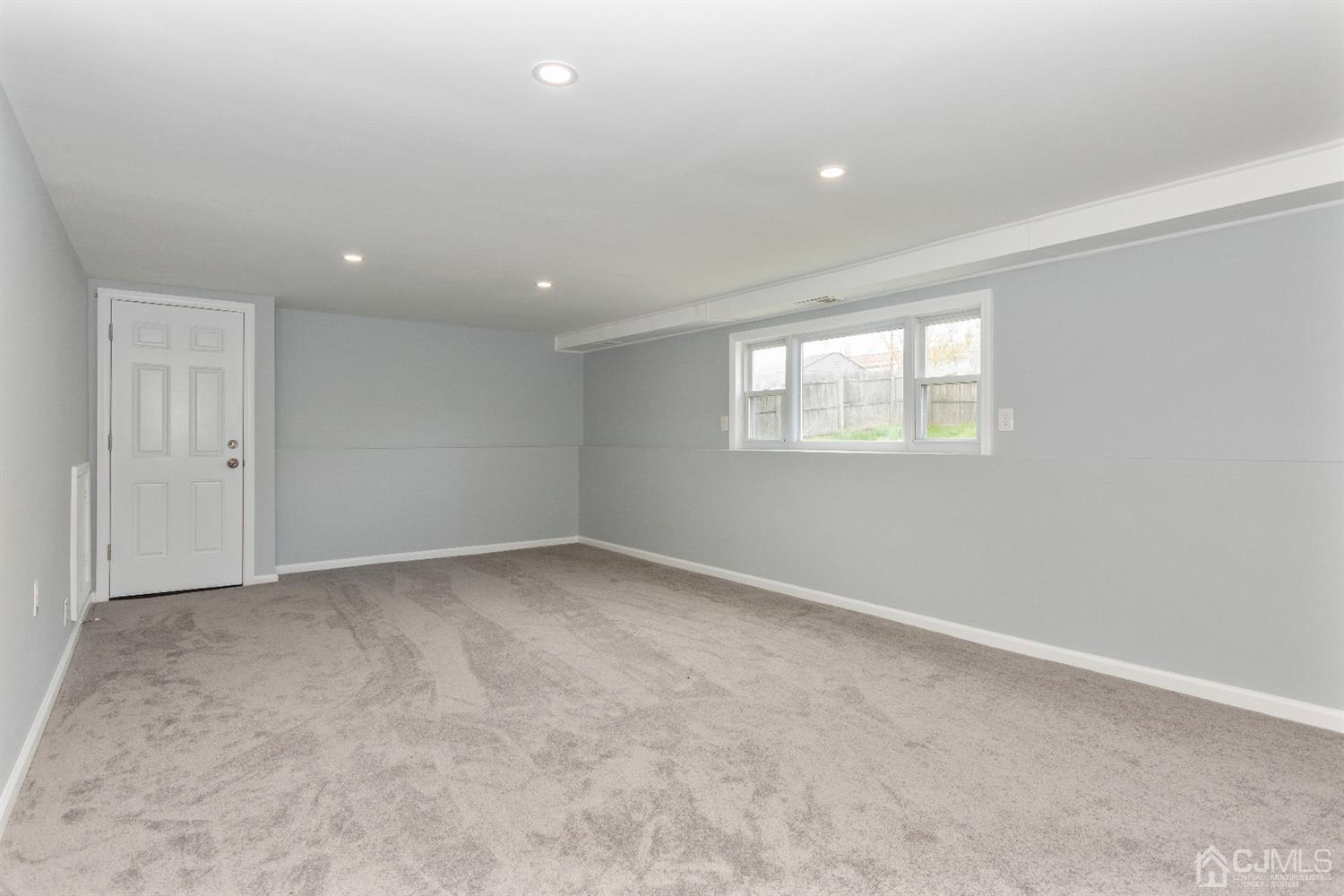 70 Westminster Road Colonia, NJ 07067 - Photo 6 of 12 an empty room with windows