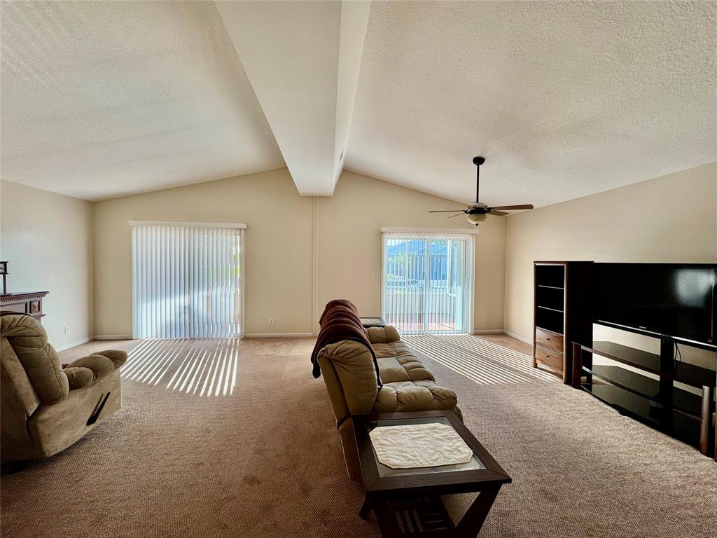 4301 Southwest 12th Way Okeechobee, FL 34974 - Photo 11 of 29 a living room with furniture