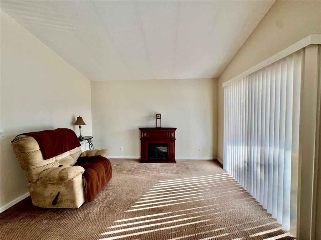 4301 Southwest 12th Way Okeechobee, FL 34974 - Photo 12 of 29 a bedroom with a large bed and a couch
