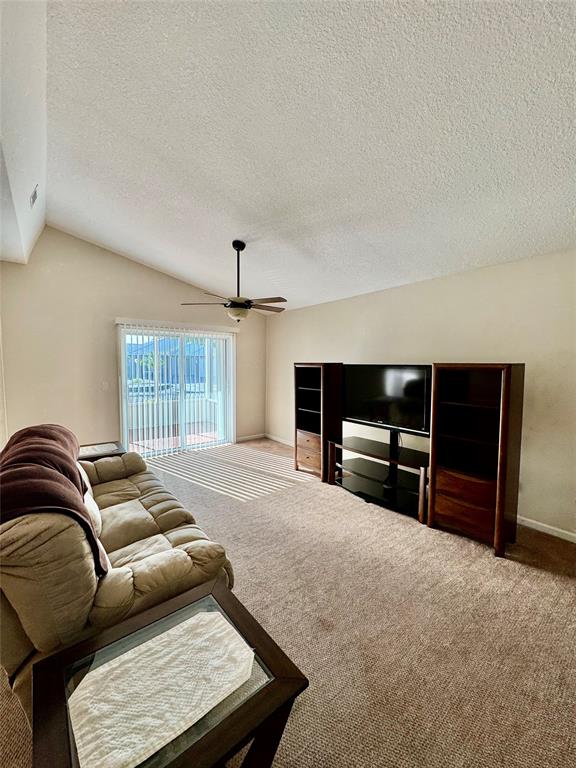 4301 Southwest 12th Way Okeechobee, FL 34974 - Photo 14 of 29 a living room with furniture