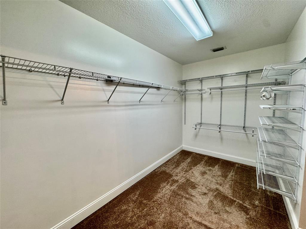 4301 Southwest 12th Way Okeechobee, FL 34974 - Photo 21 of 29 a view of a room with racks on the wall