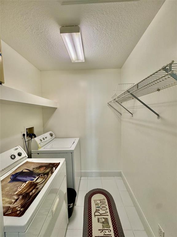 4301 Southwest 12th Way Okeechobee, FL 34974 - Photo 24 of 29 a utility room with dryer and washer