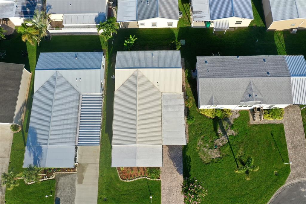 4301 Southwest 12th Way Okeechobee, FL 34974 - Photo 8 of 29 an aerial view of a house with a yard
