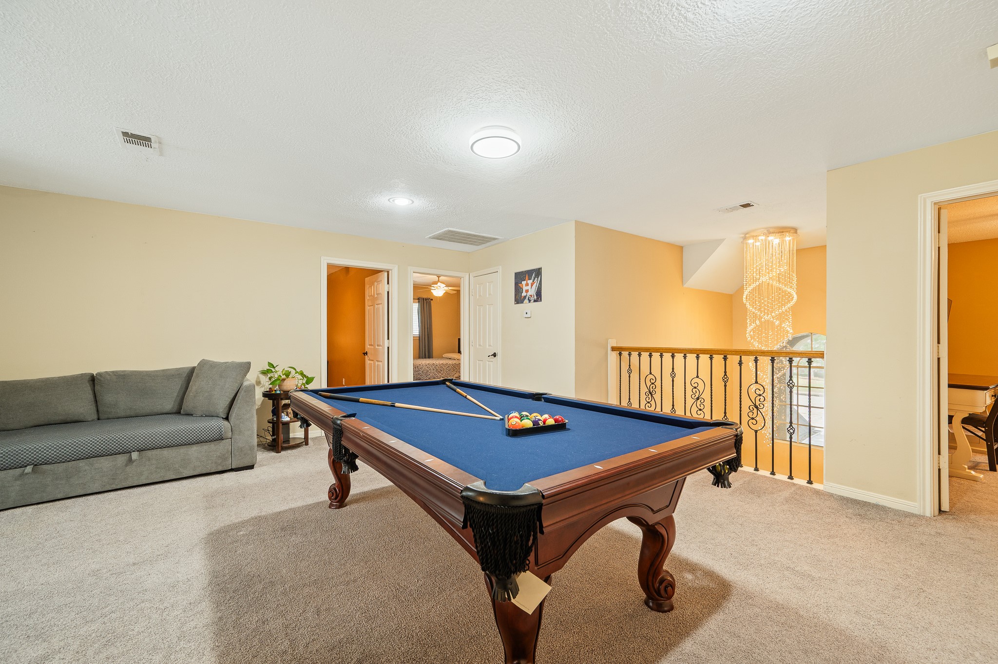 8111 Morningbrook Court Spring, TX 77379 - Photo 26 of 46 a living room with furniture pool table and a table