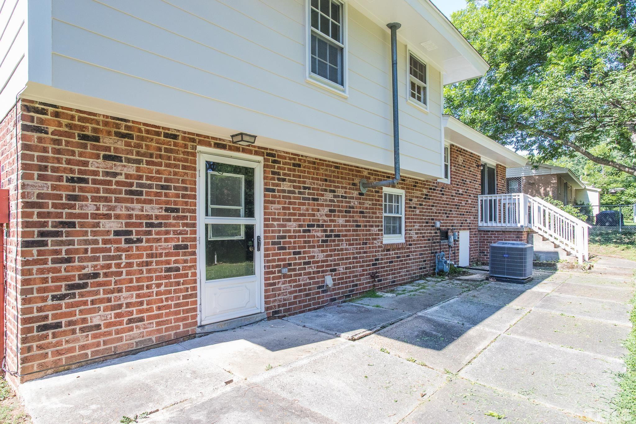 3715 Tulane Drive Raleigh, NC 27604 - Photo 11 of 39 a view of a brick house with many windows
