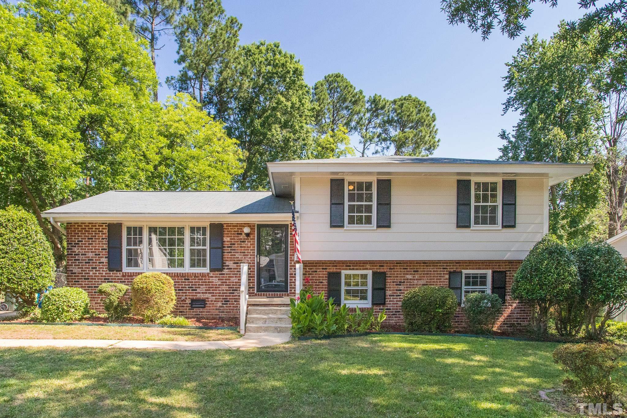 3715 Tulane Drive Raleigh, NC 27604 - Photo 2 of 39 a view of a house with a yard and plants