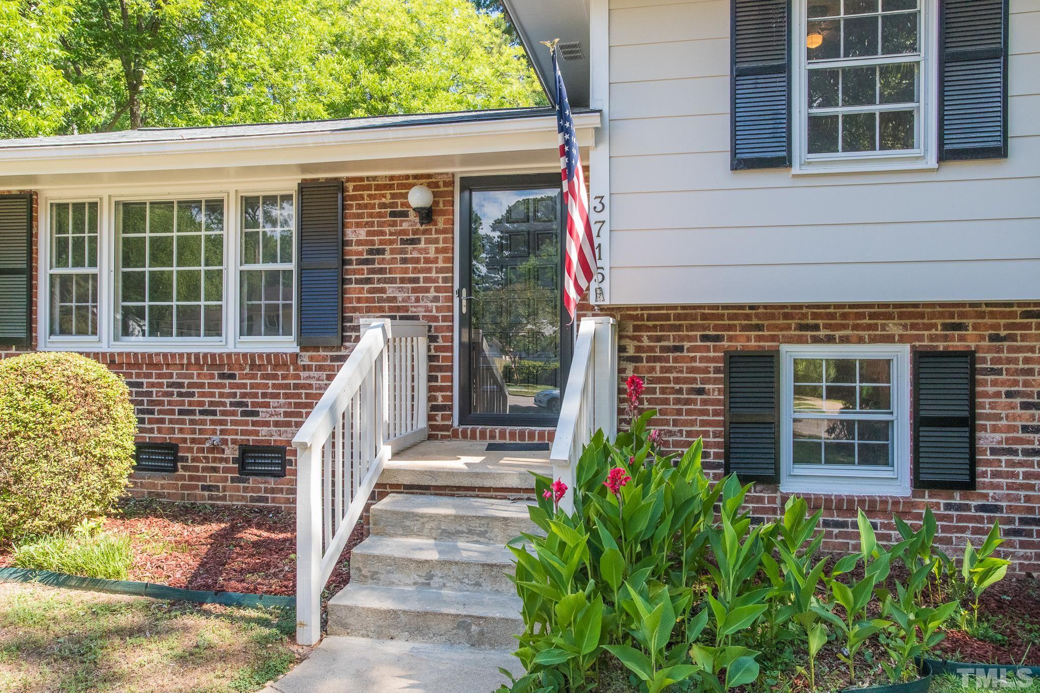 3715 Tulane Drive Raleigh, NC 27604 - Photo 6 of 39 a front view of a house with a porch