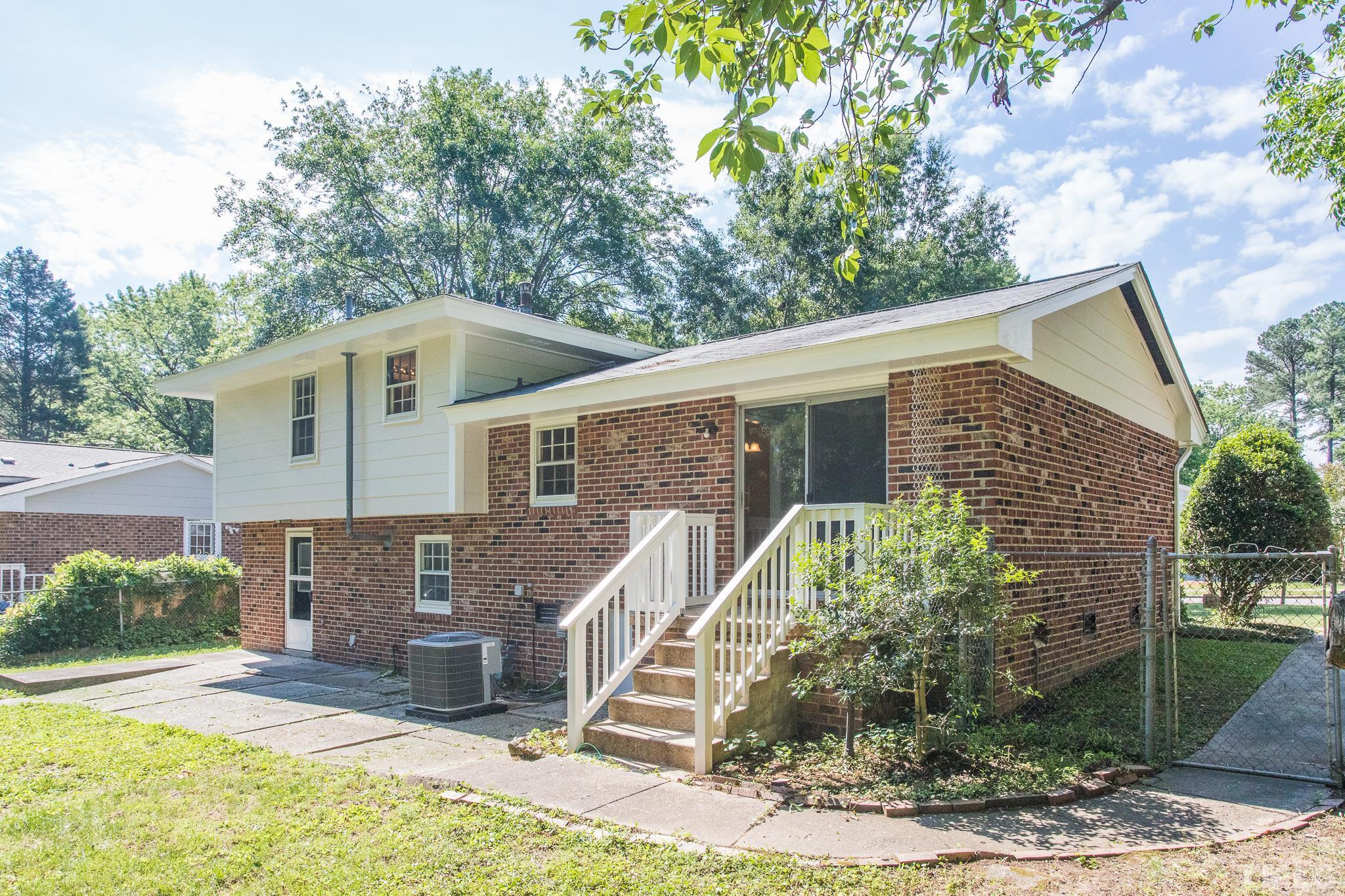 3715 Tulane Drive Raleigh, NC 27604 - Photo 8 of 39 a front view of a house with garden
