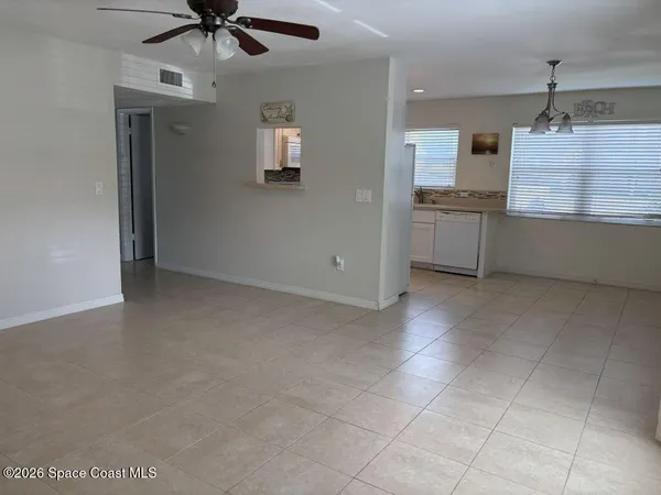 a view of a kitchen with a sink