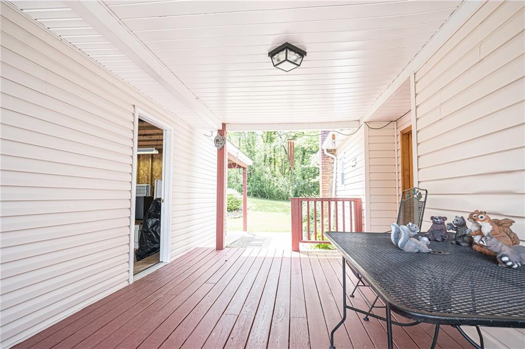 654 Joffre Cherry Valley Road Burgettstown, PA 15021 - Photo 22 of 25 Covered breezeway from huge garage to home.