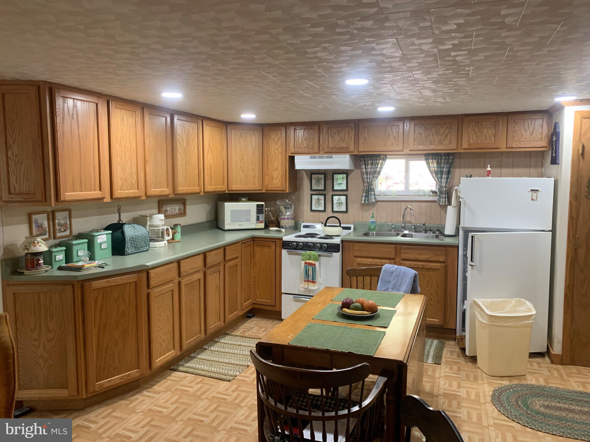 5547 Fox Road Fort Loudon, PA 17224 - Photo 19 of 27 Cozy kitchen with warm wooden tones.