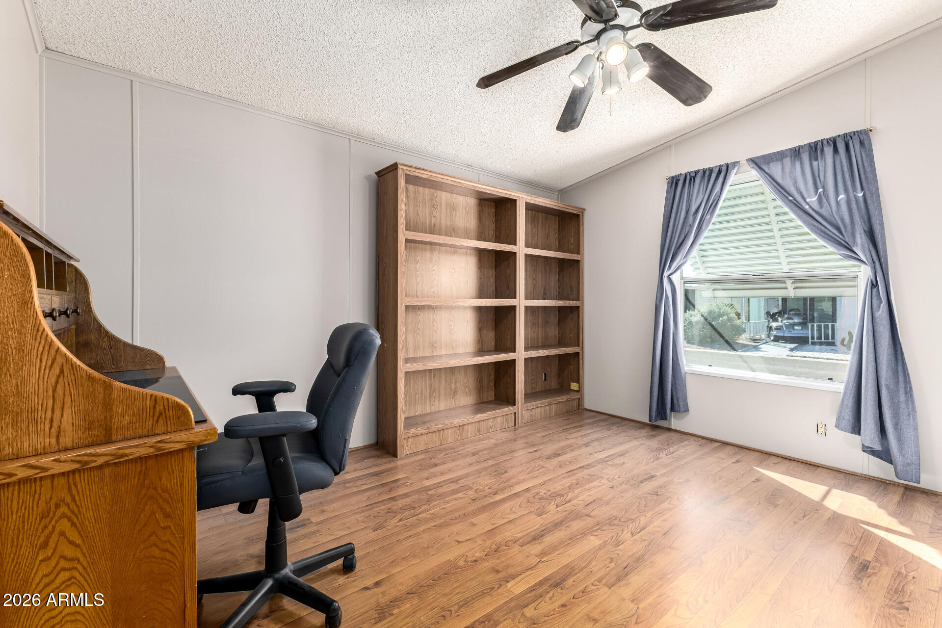 3330 East Main Street, Unit 446 Mesa, AZ 85213 - Photo 19 of 29 a view of workspace with wooden floor windows