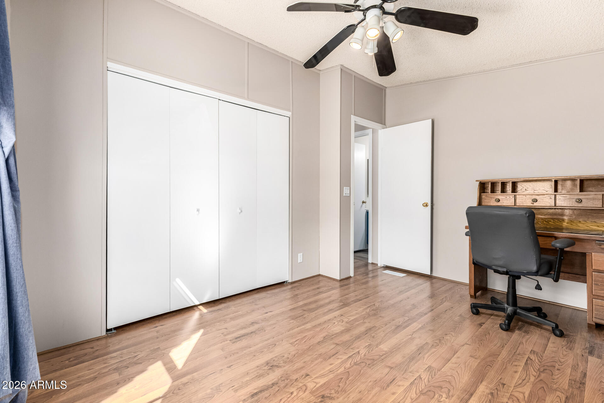 3330 East Main Street, Unit 446 Mesa, AZ 85213 - Photo 20 of 29 a view of a workspace with furniture and a window