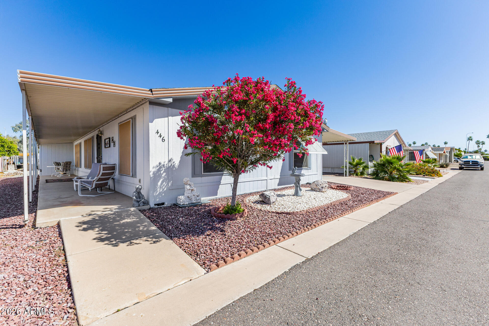 3330 East Main Street, Unit 446 Mesa, AZ 85213 - Photo 2 of 29 a front view of a house