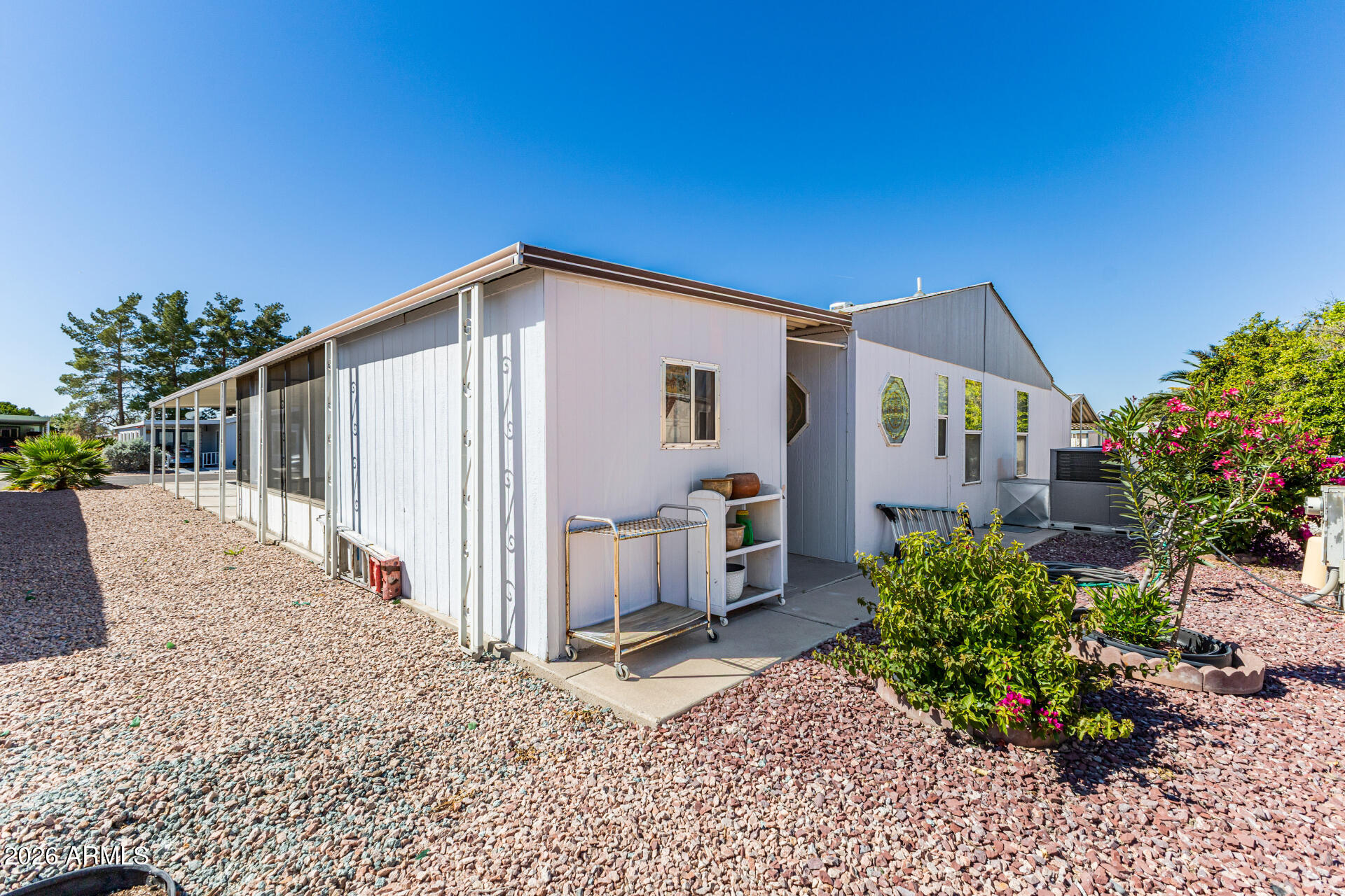 3330 East Main Street, Unit 446 Mesa, AZ 85213 - Photo 29 of 29 a view of a house with a backyard