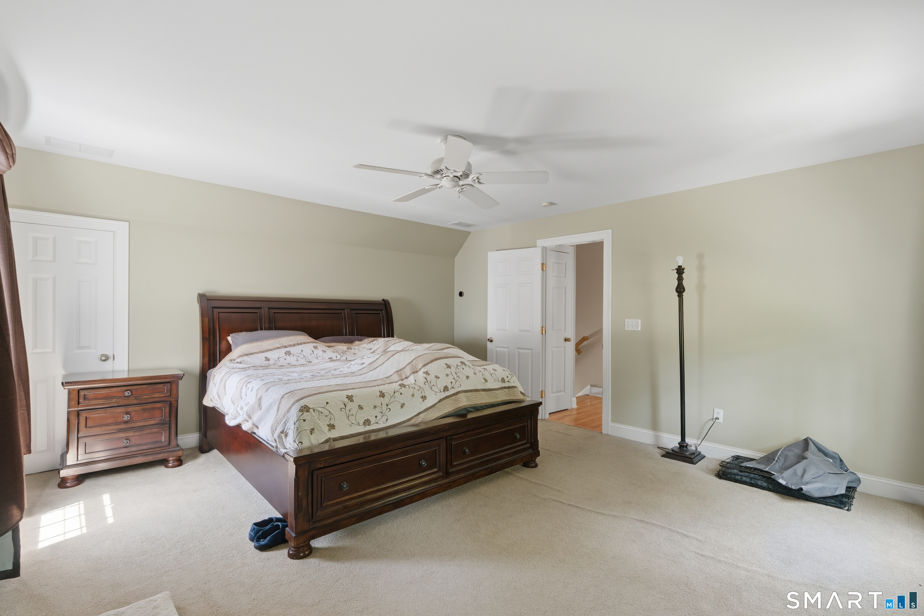 48 Case Road Burlington, CT 06013 - Photo 24 of 39 a spacious bedroom with a bed and a cabinets