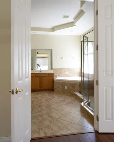 a view of a living room with a large window