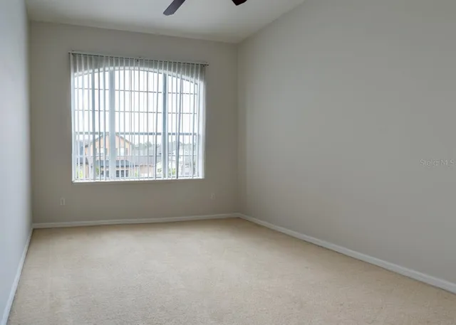 a bathroom with a bathtub a sink a vanity and a shower